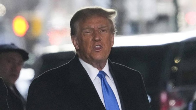 Former President Donald Trump leaves his apartment building in New York. Photo / AP