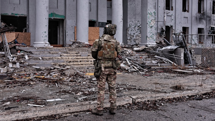 A Ukrainian serviceman looks at the Donetsk National Technical University building destroyed by Russian shelling on January 18, 2025 in Pokrovsk, Ukraine. In July 2024, Russia renewed efforts to reach and capture Pokrovsk in a new offensive. (Photo by Yan Dobronosov/Global Images Ukraine via Getty Images)