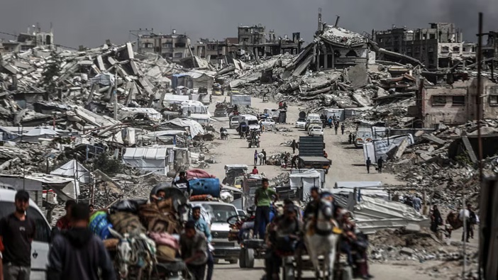 Palestinians flee with their belongings to the safe areas after Israeli airstrikes in Gaza City on May 17, 2025. Photo / Getty Images