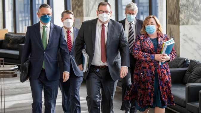 Deputy Prime Minister Grant Robertson arriving with ministers James Shaw (left), Michael Wood, Damien O'Connor and Megan Woods, before announcing the Government's Emission Reduction Plan. Photo / Mark Mitchell