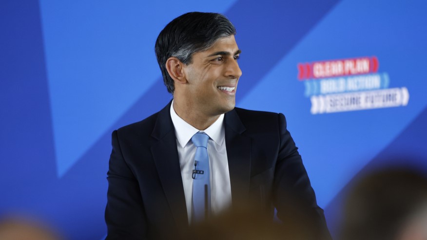 Britain's Prime Minister and Conservative Party leader, Rishi Sunak, delivers a speech to launch the Conservatives' general election manifesto in Silverstone, England, on Tuesday June 11, 2024, in the build-up to the UK general election on July 4. (Benjamin Cremel, Pool Photo via AP)