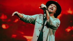 Eddie Vedder seemed happy to be on stage at Auckland’s Mt Smart Stadium for Pearl Jam’s Dark Matter tour on November 8. Photo / Tom Grut (Frog Productions)
