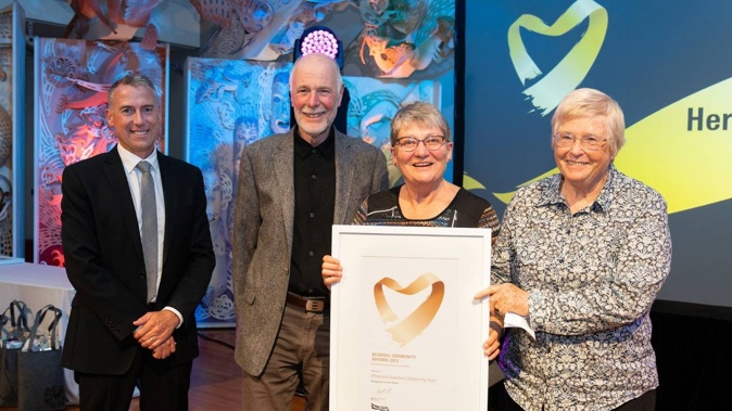 Wellington Airport chief executive Matt Clarke (left) with Whareroa Guardians Community Trust trustees Bruce Bulmer, Liffet Stewart and Ann Evans. Photo / Mark Tantrum Photography
