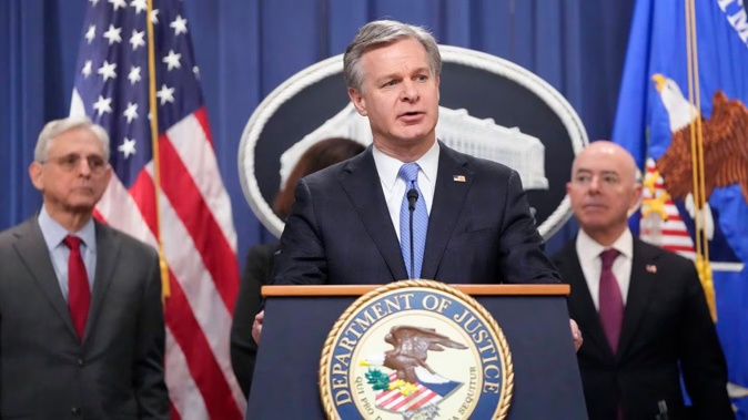 FBI Director Christopher Wray, speaks with reporters during a news conference at the Department of Justice. Photo / AP