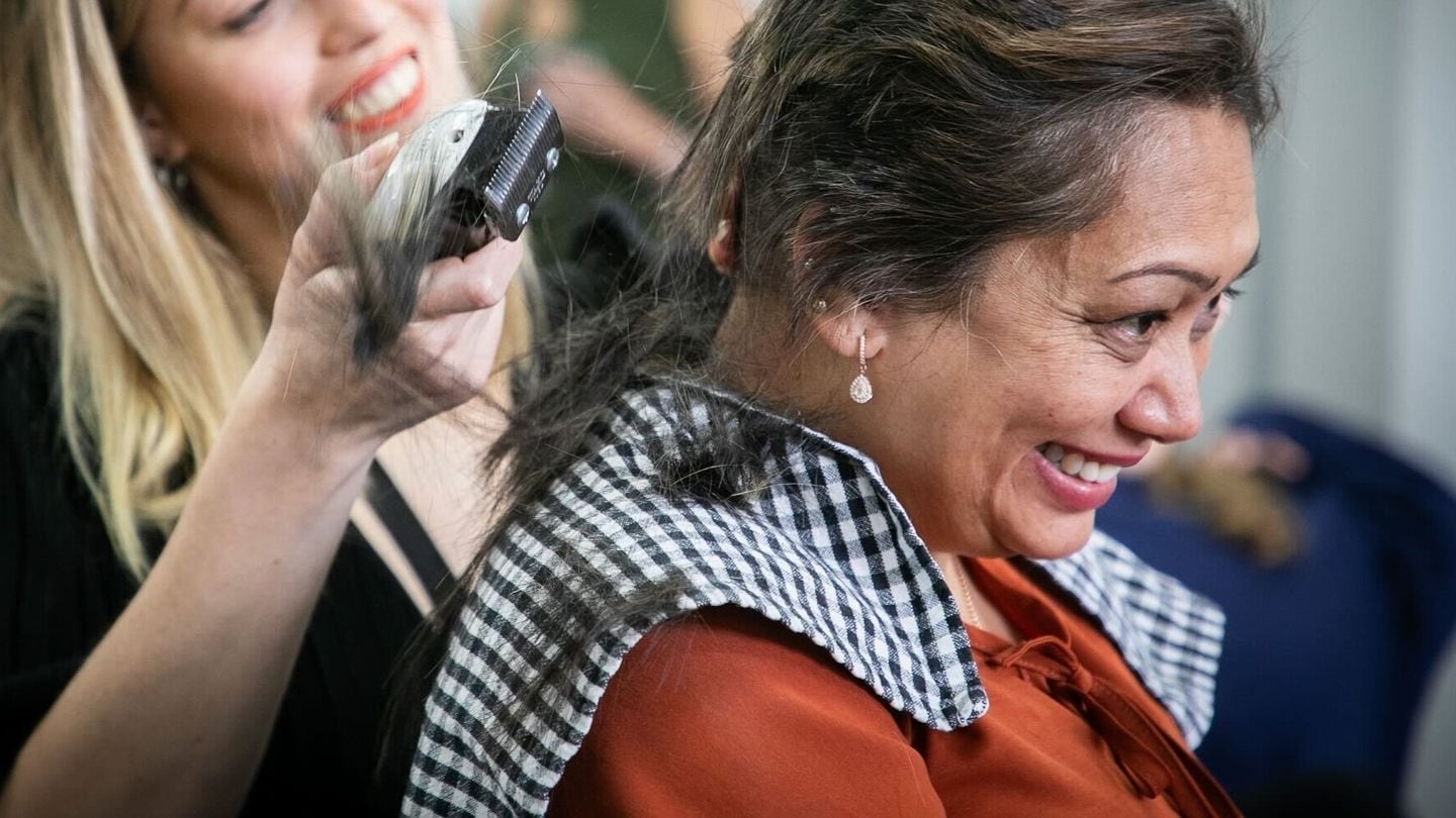 Grace (Kanila) Patel nearly died twice in the course of her rare cancer treatment but did not lose her hair. She used that to raise money for the Cancer Society on Friday with a shave from hairdresser Gracie Nisbet. Photo / Warren Buckland