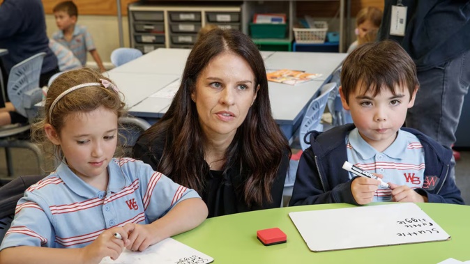 Education Minister Erica Stanford with students at Wadestown School in Wellington in January. Photo / Mark Mitchell
