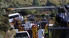 Emergency services attend a crash between a car and a bus on Kingston Rd.