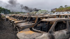 Burnt cars are lined up after unrest in Noumea, New Caledonia. Photo / AP