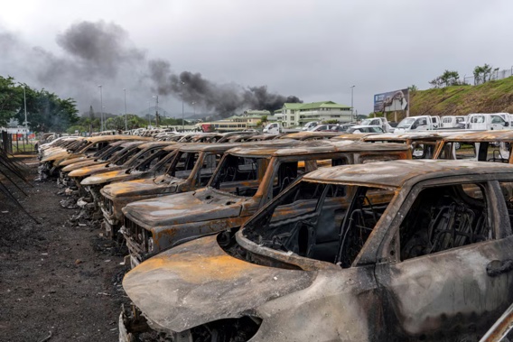 Burnt cars are lined up after unrest in Noumea, New Caledonia. Photo / AP
