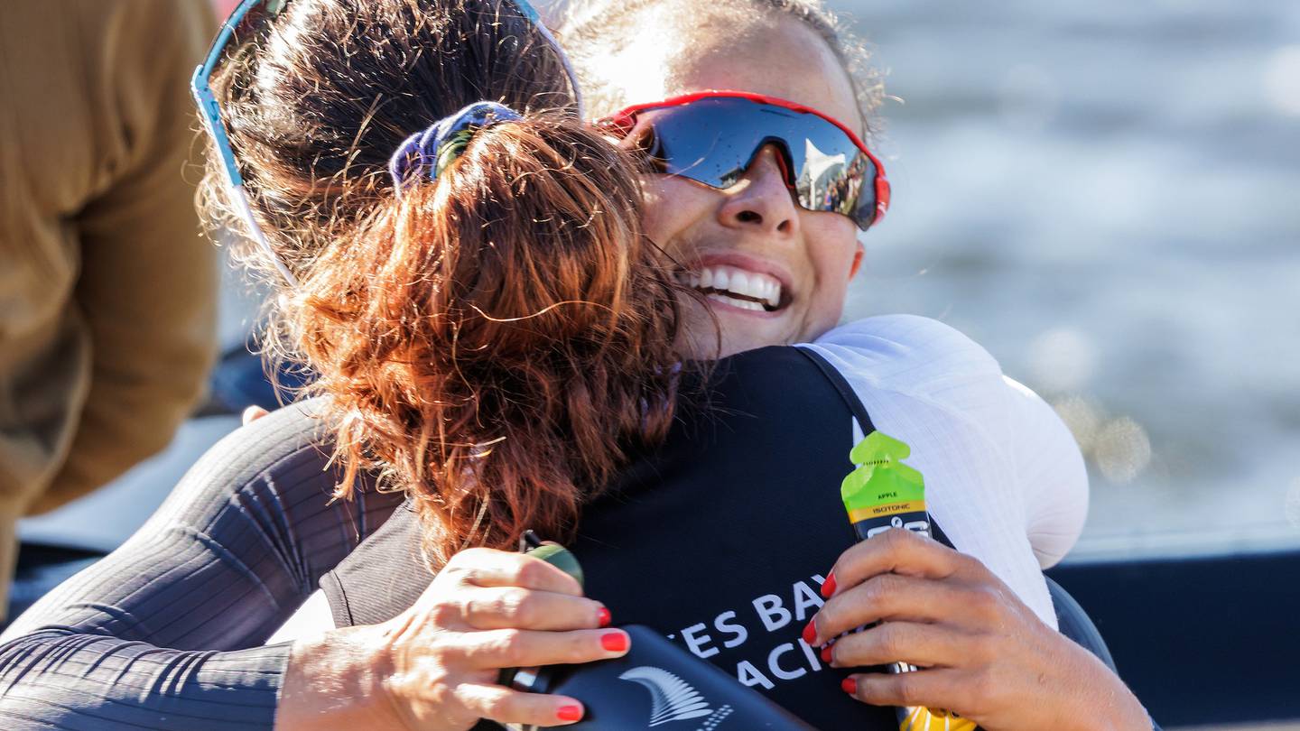 Lisa Carrington congratulates Aimee Fisher on winning the K1 500m final during the NZ Canoe Sprint Championships 2022 at Lake Karapiro in Waikato. (Photo / Photosport.co.nz)