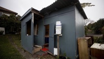 Auckland backyard shanty town ruled 'compliant' by council