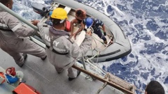 Members of the Republic of Fiji Navy rescue a crewman of the TIRO II. (Photo / Rescue Coordination Centre Fiji)