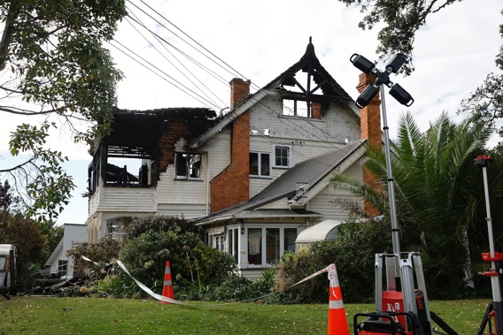 Investigators are now combing the remains of Parnell's City Garden Lodge after a huge fire tore through the property on Sunday.