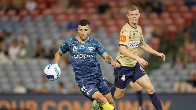 Jaushua Sotirio attempts to evade Jordan Elsey in Newcastle. (Photo / Getty Images)