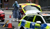 A police forensics officer photographs shoes and clothes at a crime scene on Golders Green Rd, London, on April 29, 2026, after two people were stabbed. Photo / AFP
