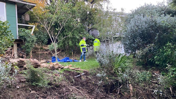 Investigators work at a property in Wadestown, Wellington, where a human skull was uncovered in the garden. Photo / Vita Molyneux