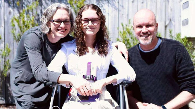 Selah Ritchie with her father, Newstalk ZB host Frank Ritchie and mother Melva Ritchie. The family has just returned from Germany where Selah had surgery to treat her debilitating Ehlers-Danlos Syndrome.