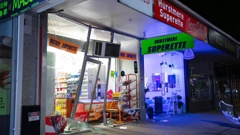 The damaged shop front at Hurstmere Rd Superette in Takapuna after a ram raid on the night of August 9. Photo / Hayden Woodward