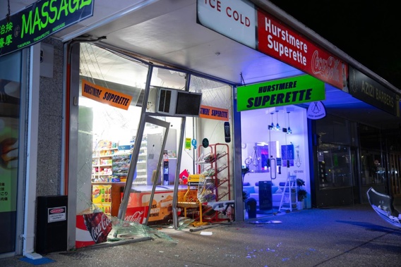 The damaged shop front at Hurstmere Rd Superette in Takapuna after a ram raid on the night of August 9. Photo / Hayden Woodward