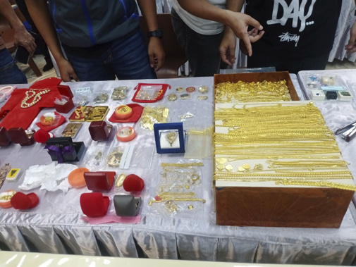 In this handout photo released by Thai police Central Investigation Bureau and taken Wednesday, May 10, 2023, Thai police display gold and other jewelry they discovered in a raid on a Buddhist temple at police station in Nakhon Ratchasima, northeast of Thailand. Photo / AP