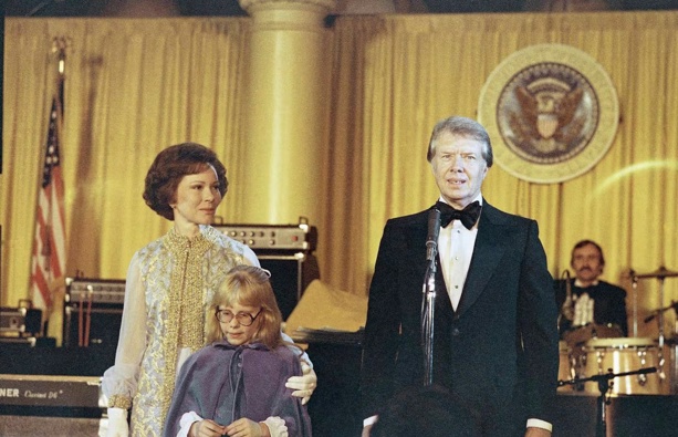 President Jimmy Carter, right; his wife Rosalynn Carter, left; and their daughter Amy, centre, during a reception for the Democratic National Committee at the White House. Photo / AP