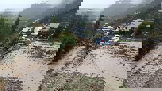 Devenish Place in Nelson where a culvert turned into a torrent of mud as heavy rains hit last week. (Photo / Supplied)