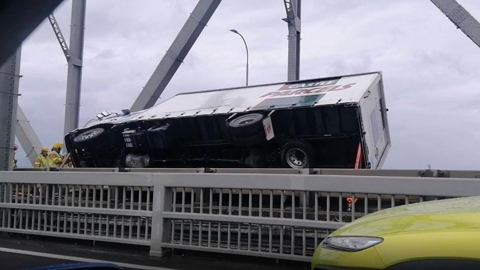 A truck was blown on its side in a freak gust of wind in September 2020 when winds gusted up to 127km/h. Photo / File