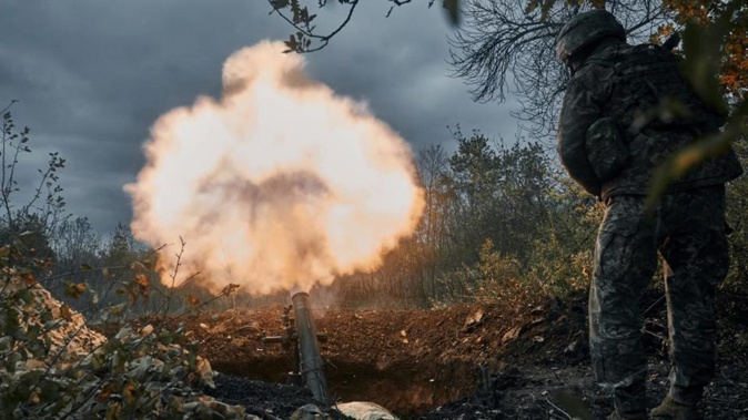 Ukrainian soldiers fire on Russian positions with mortar in Bakhmut, Donetsk region. Photo / AP