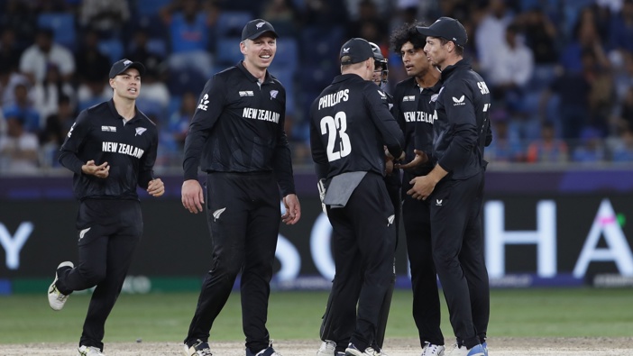Rachin Ravindra of New Zealand celebrates after taking the wicket of Rohit Sharma captain of India during the ICC Champions Trophy 2025 final match India between New Zealand at Dubai International Stadium on March 9, 2025 in Dubai, United Arab Emirates. (Photo by Surjeet Yadav/MB Media/Getty Images)