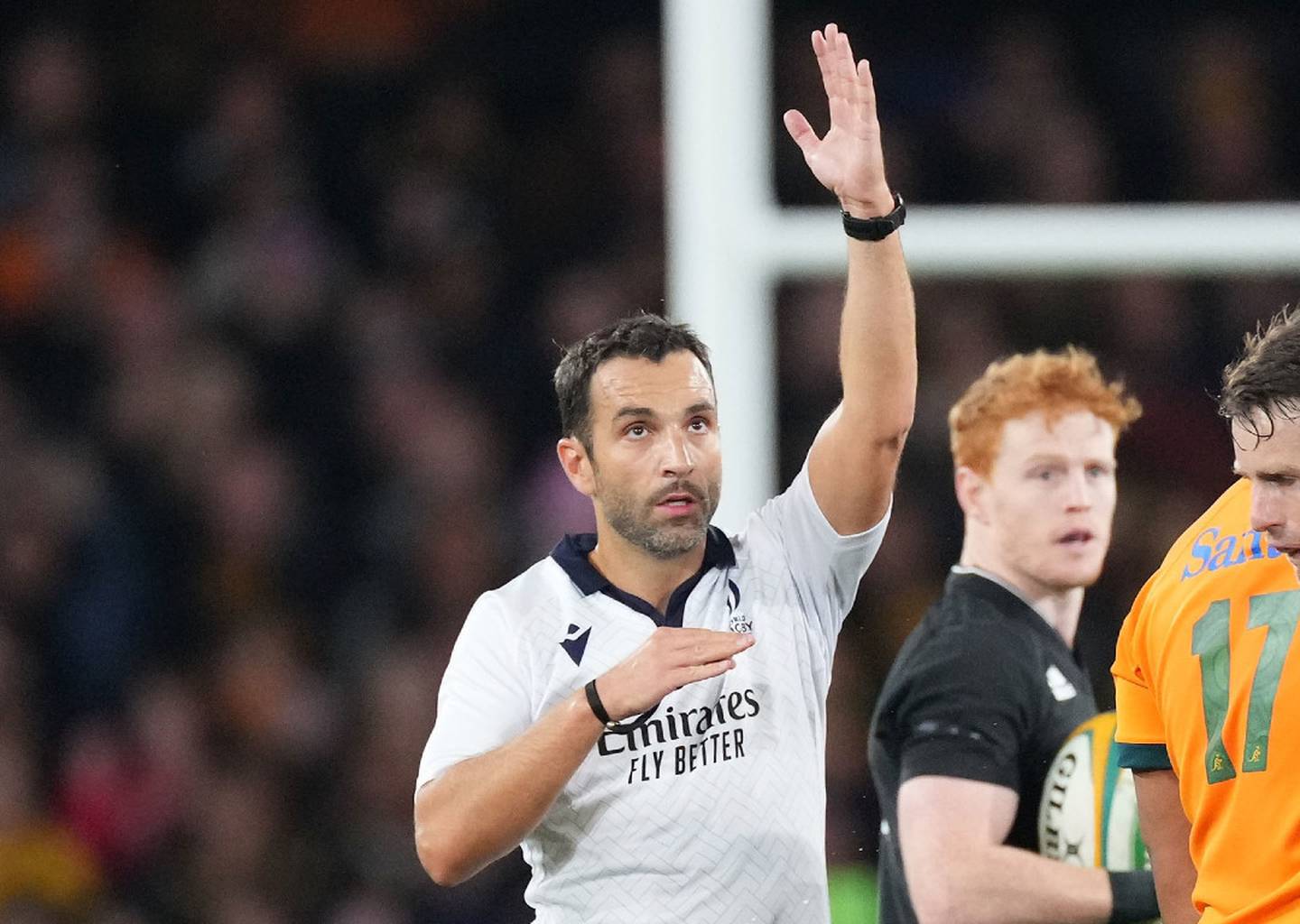 Referee Mathieu Raynal signals his controversial decision. Photo / Photosport
