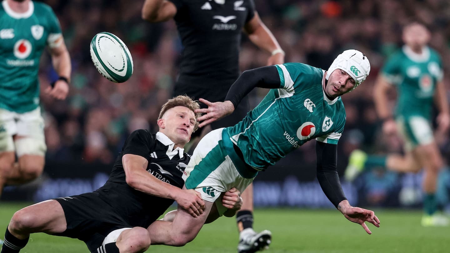 Ireland’s Mack Hansen tackled by Damian McKenzie of New Zealand during last year's test in Dublin. ©INPHO/Dan Sheridan / Photosport