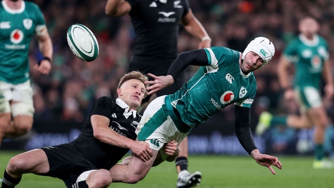 Ireland’s Mack Hansen tackled by Damian McKenzie of New Zealand during last year's test in Dublin. ©INPHO/Dan Sheridan / Photosport