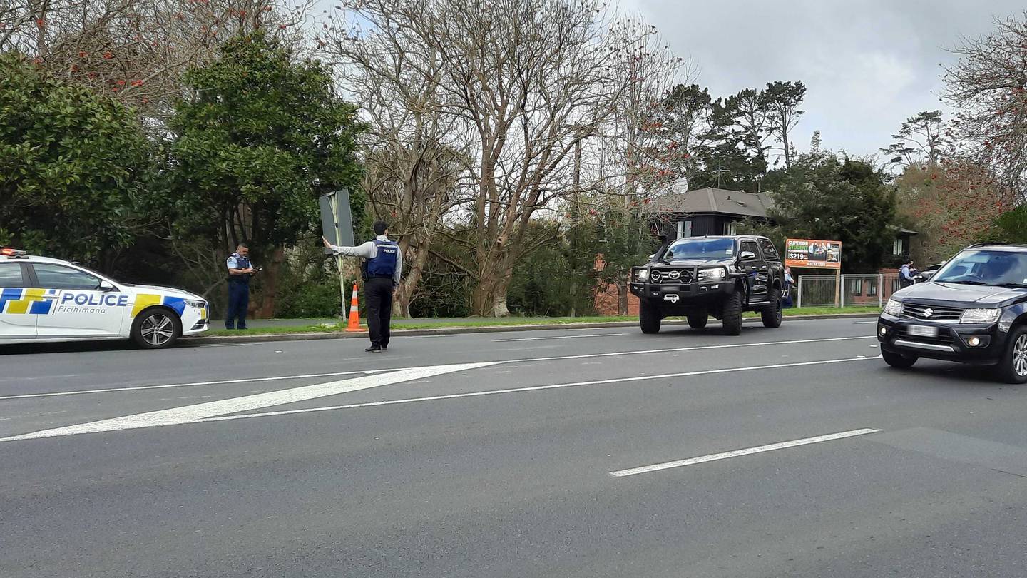 The scene in Waterview where one person has been taken to hospital after being found in a serious, but non-life-threatening, condition in Auckland. Photo / Rose Garratt