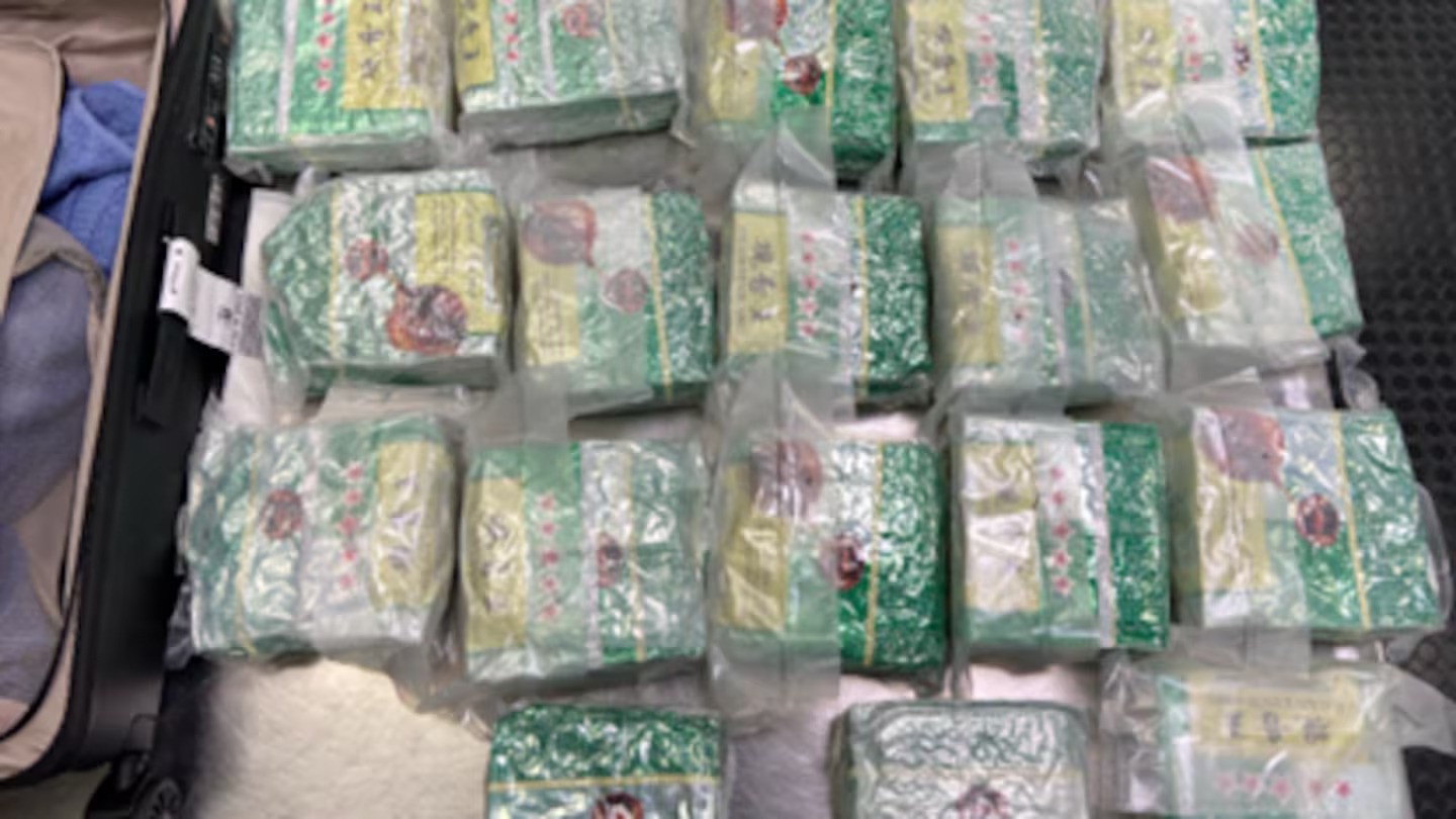 Young women charged after $13m of meth disguised as tea found at airport