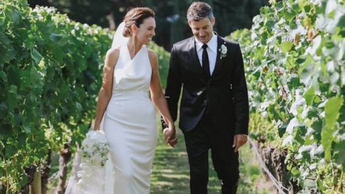 Dame Jacinda Ardern and Clarke Gayford pictured at their wedding. Photo / Felicity Jean Photography