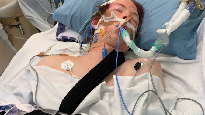 Aaron Hanson in Auckland City Hospital intensive care unit in 2020 after a crash on Muriwai Beach. Photo / Phil Hanson