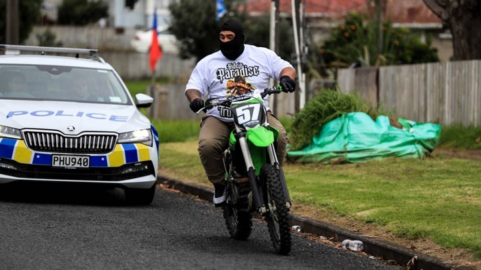 Police apprehend a gang of dirt bike riders near the Ngati Otara Reserve. Photo / Hayden Woodward.