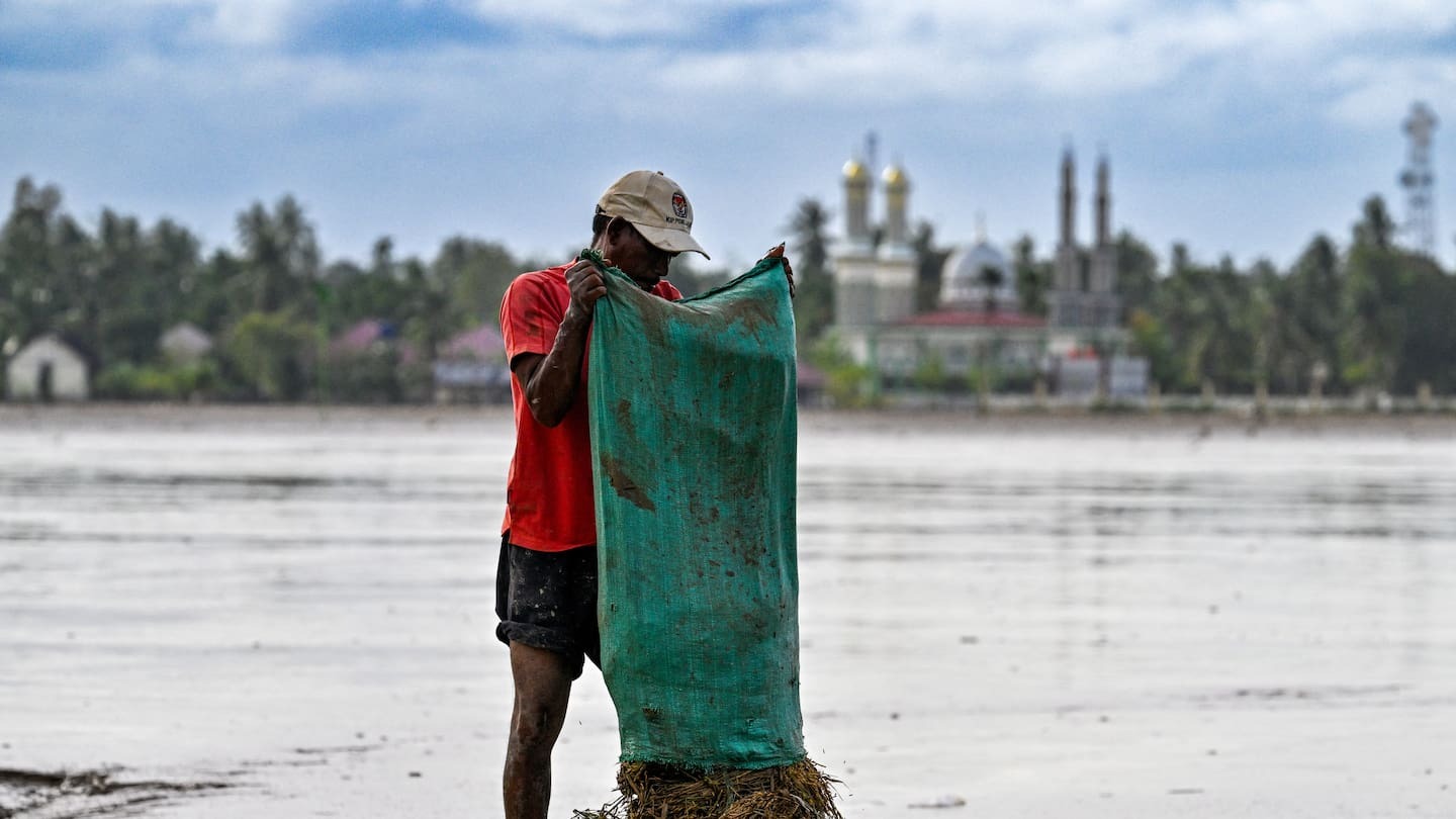 Indonesia suffers food, medical shortages as Asia flood tolls rise