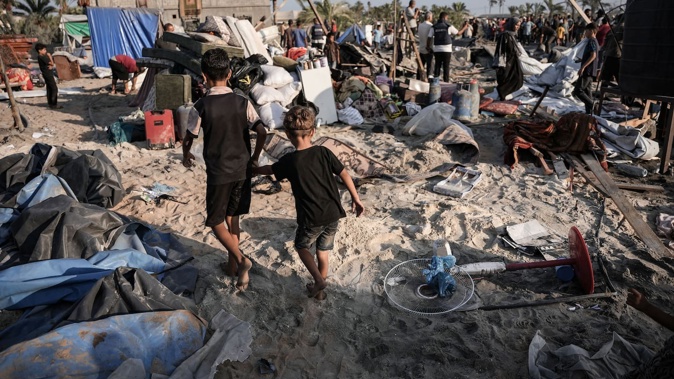 A view from the area after Israeli airstrikes on a tent encampment in Khan Yunis, Gaza. Photo / Getty Images