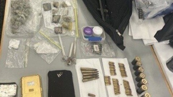 Hide 'n seek: Guns, drugs found in car engine bay as police swoop property