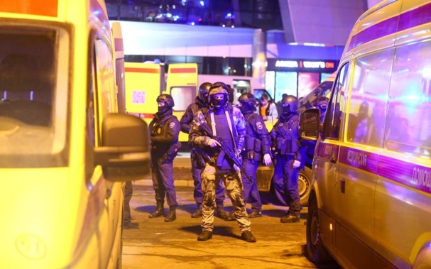Medics and law enforcement officers are seen outside the Crocus City Hall concert hall following a shooting incident in Krasnogorsk, outside Moscow, on 22 March, 2024. Photo / AFP