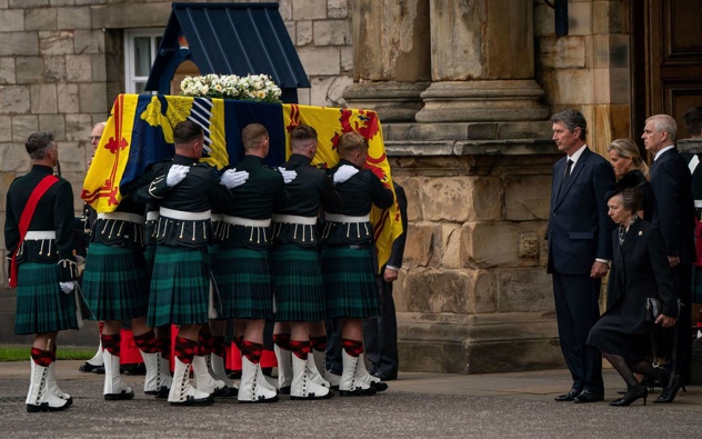 Vice Admiral Timothy Laurence, Princess Anne, Prince Andrew and Sophie, Countess of Wessex watch as the coffin of Queen Elizabeth II arrives at Holyroodhouse, Edinburgh. Photo / AP