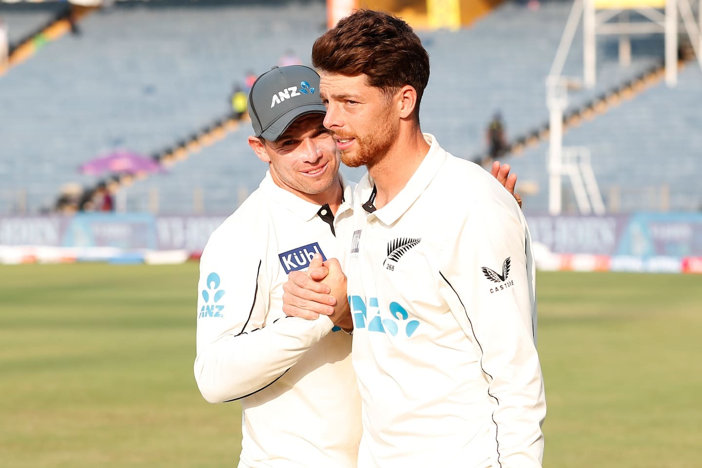 Mitchell Santner is congratulated by skipper Tom Latham. Photo / Photosport