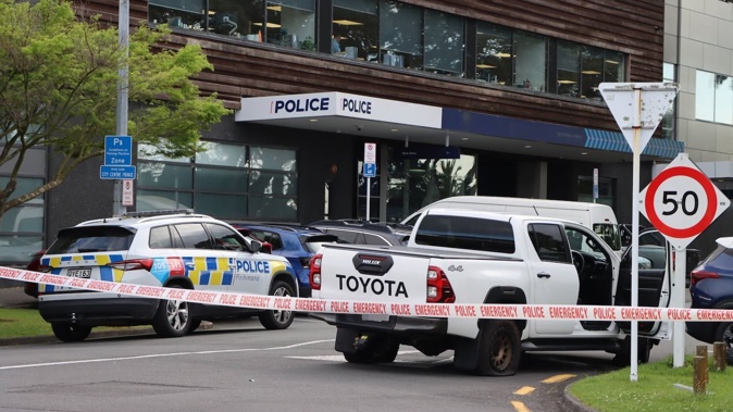 A heavy police presence on Monmouth St, near the Tauranga Police Station. Photo / Bijou Johnson