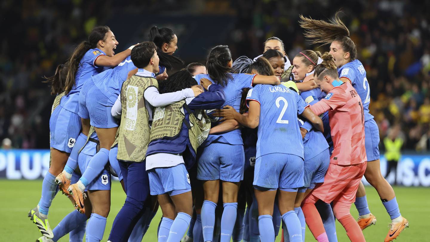 France celebrate their win over Brazil. Photo / AP