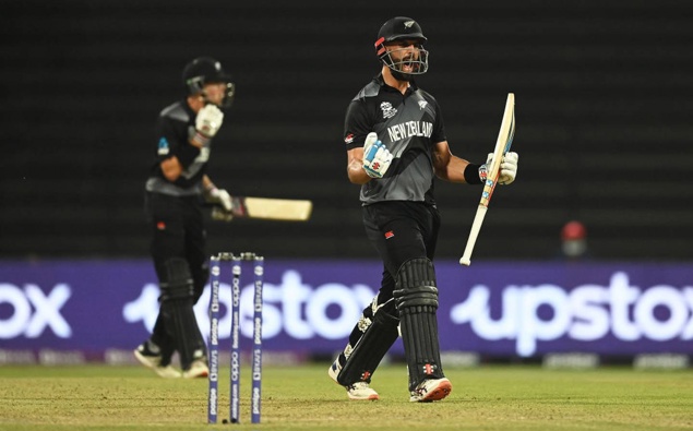 Daryl Mitchell celebrates hitting the winning runs in the semi-final against England. (Photo / Getty)