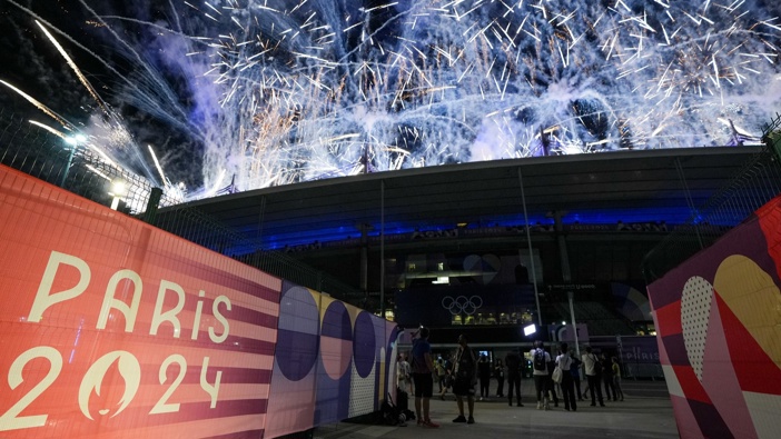 Fireworks illuminate the sky at the end of the closing ceremony of the Paris 2024 Olympic Games at the Stade de France on August 12, 2024 in Paris, France. (Photo by Mustafa Ciftci/Anadolu via Getty Images)