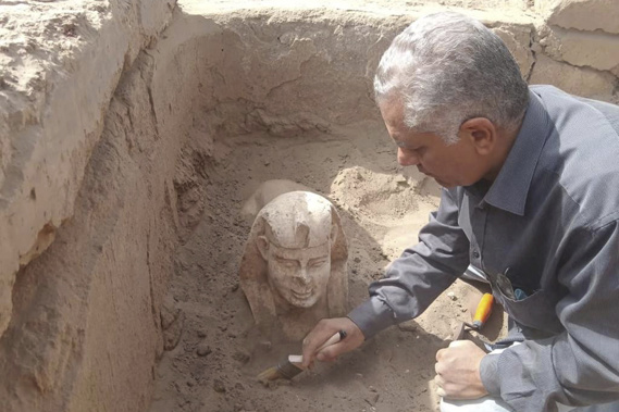 A sphinx statue believed to be made in the likeness of a Roman emperor is uncovered from an archaeological site in Qena, Egypt. Photo / Egyptian Ministry of Tourism and Antiquities via AP