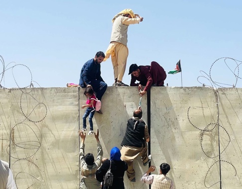 There were desperate scenes with thousands of people trying to flee Kabul via its international airport. Photo / Getty Images