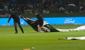 The covers go on as the rain falls during the Chappell–Hadlee T20I Series at Bay Oval. Photo / Photosport